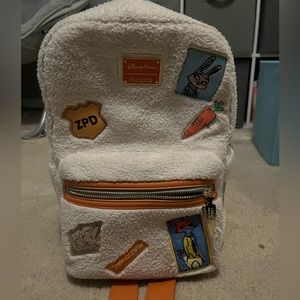 Gently used zootopia loungefly backpack